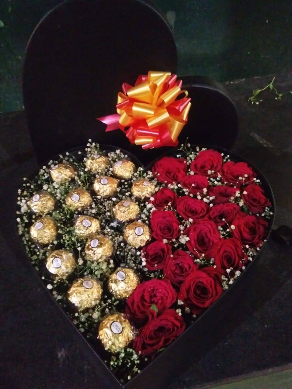 Red roses and  rocher chocolate heart shape